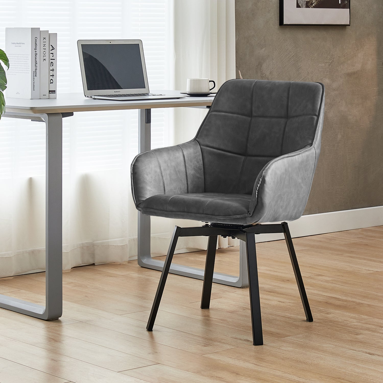 Danyl Faux Leather Swivel Dining Chairs